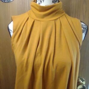 Sm. Mustard Sleeveless Turtleneck Top